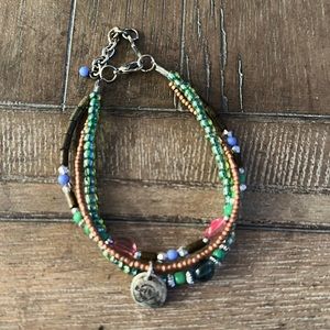 Hard Rock Cafe Three a strand Beaded Bracelet With Hard Rock Logo Charm